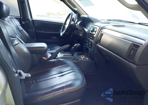 2004 Jeep Grand Cherokee Laredo z USA, uszkodzony, nr VIN 1J4GW48S34C144831